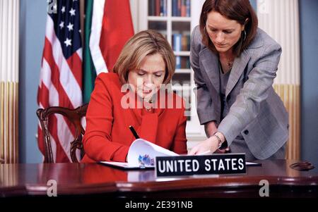 US Secretary of State Hillary Clinton signs the US-South African PEPFAR Partnership Framework Agreement during a ceremony at the US State Department in Washington,DC on December 14, 2010. . Photo by Olivier Douliery/ ABACAUSA.com Stock Photo