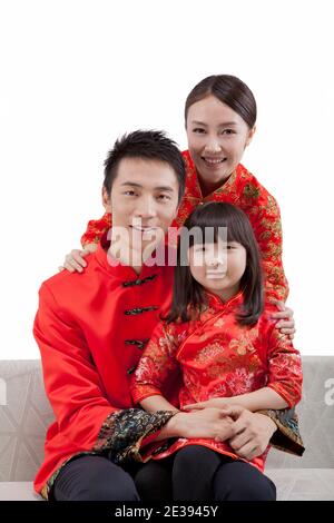 Portrait of daughter with parents in Tang suits high quality photo Stock Photo