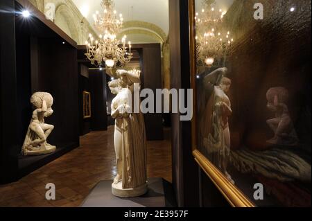 The Callipygian Venus (on right) and the statue of Atlas (on left) pictured at Palazzo Farnese in Rome, Italy on December 2010. Palazzo Farnese, the most monumental of Roman Renaissance palaces, which currently houses the French embassy in Italy, opens doors to public for the exhibition 'Palazzo Farnese - From the Renaissance to the Embassy of France' in Rome, Italy on december 17,2010. The exhibition aims to revive the intertwined stories of popes, cardinals, kings, ambassadors, and artists who, for five centuries, lived and passed through the Farnese Palace, helping to make it an exceptional Stock Photo