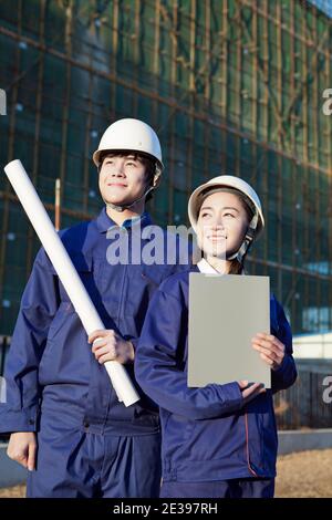 The Young Engineers working at construction field high quality photo Stock Photo