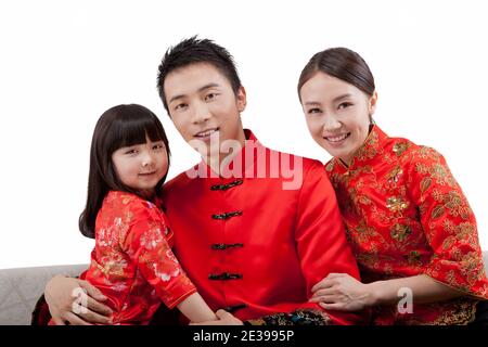 Portrait of daughter with parents in Tang suits high quality photo Stock Photo