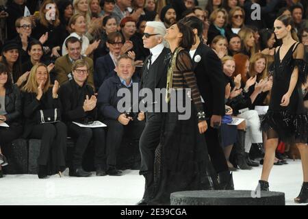 Designer Karl Lagerfeld with Former model Ines de La Fressange appear  during the Chanel spring-summer 2011 ready-to wear collection presentation  held at the Grand Palais in Paris, France on October 5, 2010.