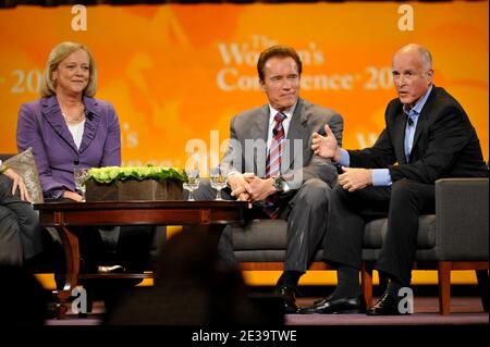 California's Gubernatorial Candidates Meg Whitman and Jerry Brown among California's Governor Arnold Schwarzenegger attend the 2010 Women's Conference held at the Long Beach convention center. Los Angeles, October 26, 2010. Photo by Lionel Hahn/ABACAPRESS.COM (Pictured : Arnold Schwarzenegger,Meg Whitman, Jerry Brown) Stock Photo