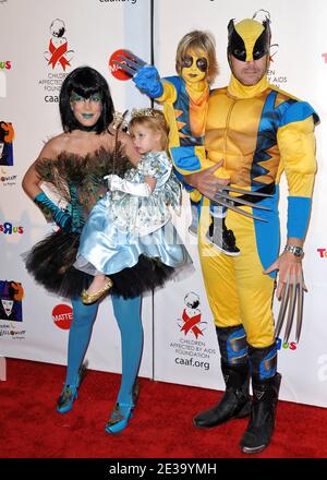 Tori Spelling, husband Dean McDermott and their children Stella and Liam arriving for the 17th Annual Dream Halloween to benefit the Children Affected by Aids Foundation, at Barker Hangar in Los Angeles, CA, USA on October 30, 2010. Photo by Lionel Hahn/ABACAPRESS.COM Stock Photo