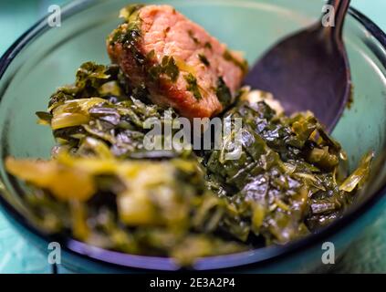 https://l450v.alamy.com/450v/2e3a2p4/collard-greens-are-served-with-black-eyed-peas-as-a-traditional-new-years-dinner-in-the-south-jan-1-2018-in-coden-alabama-2e3a2p4.jpg