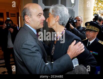 Former French Prime Minister and Mayor of Bordeaux Alain Juppe and French Minister for the Economy, Finance and Employment Christine Lagarde attend a press conference of Vice president of Manufacturing for Ford of Europe and also Ford Motor Company vice president Ken Macfarlane in Bordeaux, France on November 8, 2010. During this press conference Ken Macfarlane confirmed the intention of Ford to acquire First Aquitaine Industrie (ex-Ford) in Blanquefort near Bordeaux. Photo by Patrick Bernard/ABACAPRESS.COM Stock Photo