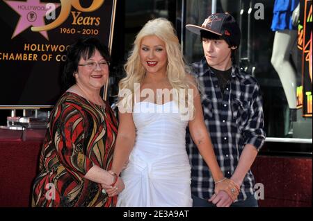 Singer Christina Aguilera poses with her mother and brother as she is honored with the 2,423rd Star on the Hollywood Walk of Fame in Hollywood, Los Angeles, CA, USA on November 15, 2010. Photo by Lionel Hahn/ABACAPRESS.COM Stock Photo