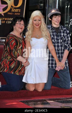 Singer Christina Aguilera poses with her mother and brother as she is honored with the 2,423rd Star on the Hollywood Walk of Fame in Hollywood, Los Angeles, CA, USA on November 15, 2010. Photo by Lionel Hahn/ABACAPRESS.COM Stock Photo