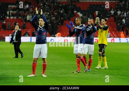 France's Samir Nasri, Loic Remy, Anthony Reveillere and Hugo Lloris celebrate victory after the final whistle during the Friendly soccer match, England vs France at Wembley Stadium in London, England on November 17, 2010. France won 2-1. Photo by Henri Szwarc/ABACAPRESS.COM Stock Photo