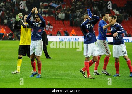 France's Hugo Lloris, Yann M'Vila, Loic Remy, Adil Rami and Anthony Reveillere celebrate victory after the final whistle during the Friendly soccer match, England vs France at Wembley Stadium in London, England on November 17, 2010. France won 2-1. Photo by Henri Szwarc/ABACAPRESS.COM Stock Photo