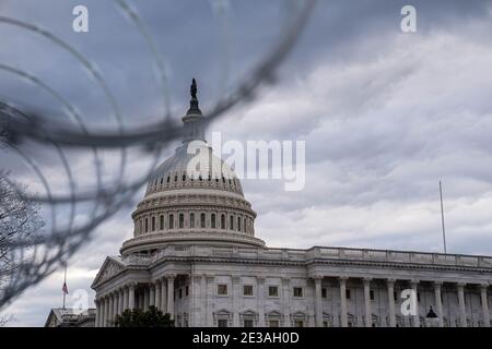 Capital Building Razor Wire razor wire atop a security fence with deep blue sky behind Stock Photo ...