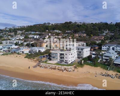 Aerial of the beach erosion in front of luxury houses and apartments at Collaroy Beach on the northern beaches of Sydney Australia Stock Photo