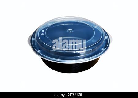 Black plastic bowl and clear lid on a white background. Stock Photo