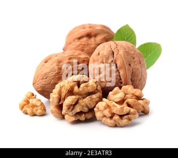 Walnuts with leaves isolated on white backgrounds. Stock Photo