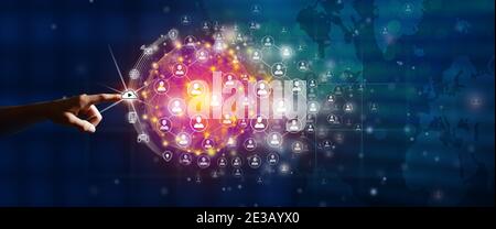 New global business connection concept. Businessman leading the global connection with connecting people orbit around the world. Stock Photo