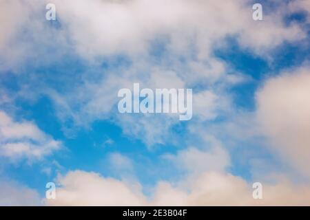 Soft and gentle, airy white clouds against the blue sky Stock Photo