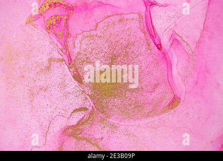 Alcohol ink pink and gold abstract stains background. Drops watercolor transparent texture Stock Photo