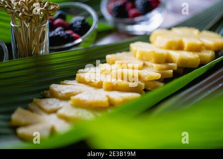 Close up fresh pineapple slices on leaf Stock Photo
