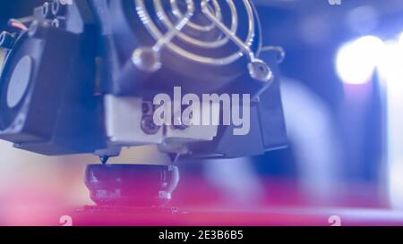 Three dimensional printing machine prints physical 3D model - close up Stock Photo