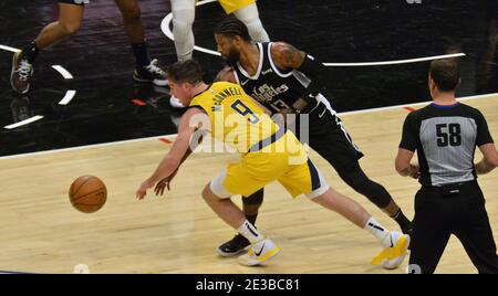 Los Angeles, United States. 18th Jan, 2021. Indiana Pacers' point guard T.J. McConnell steals the ball fromLos Angeles Clippers' forward Paul George during the fourth quarter at Staples Center in Los Angeles on Sunday, January 17, 2021. The Clippers defeated the short-handed Pacers 129-96. Photo by Jim Ruymen/UPI Credit: UPI/Alamy Live News Stock Photo