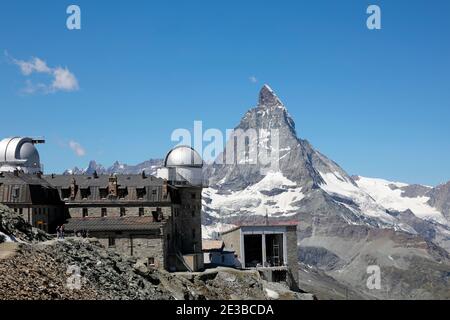 Gornergrat astronomical observatory and Matterhorn mountain in the swiss alps of Zermatt, Switzerland 2020 Stock Photo