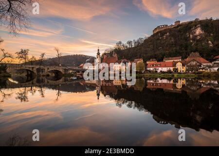 Image of a panorama city view of the market Kallmünz Kallmuenz at blue hour during sunset in Bavaria and the river Naab Vils and the castle ruin on th Stock Photo