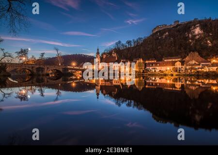 Image of a panorama city view of the market Kallmünz Kallmuenz at blue hour during sunset in Bavaria and the river Naab Vils and the castle ruin on th Stock Photo