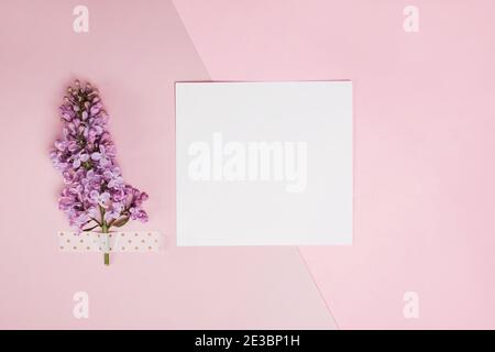 Blank paper mock-up with little lilac flowers Stock Photo