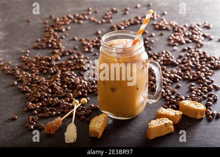 iced coffee in a jar on dark table Stock Photo