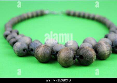 Close up of a chunky beaded grey necklace Stock Photo