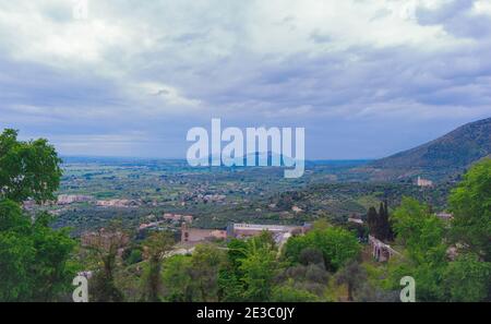 The breathtaking landscapes of Italy. Panoramic view Gregorian villa surroundings against the background of an ensemble of clouds Stock Photo