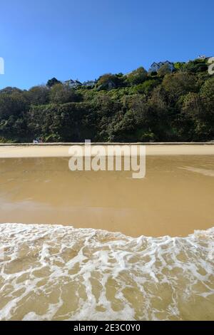 The sea gently rolling in on the shore at Carbis Bay in Cornwall, UK. Stock Photo