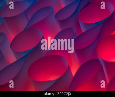 Abstract close up photo of curve shapes made of white paper backlit illuminated with blue and red filter Stock Photo