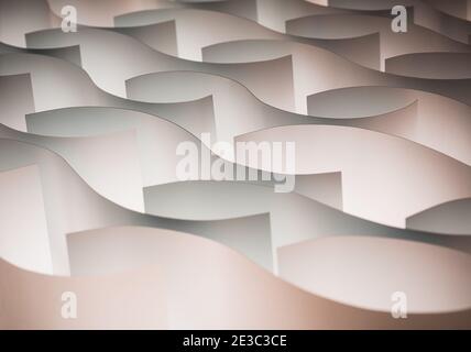 Blank and empty white paper sheet like waves backlit illuminated in studio Stock Photo