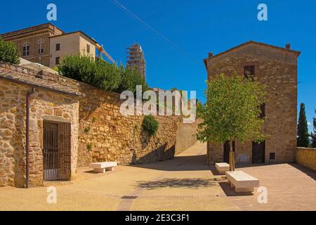 Historic stone buildings on the old walls of Pienza in Siena Province, Tuscany, Italy Stock Photo