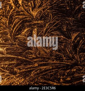Ice patterns or frost patterns formed on the bodywork of a car during a freezing cold night, England, UK. Frost ferns, fractal, pattern Stock Photo