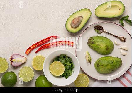 Ingredients for Mexican Sauce Guacamole cooking background. Stock Photo