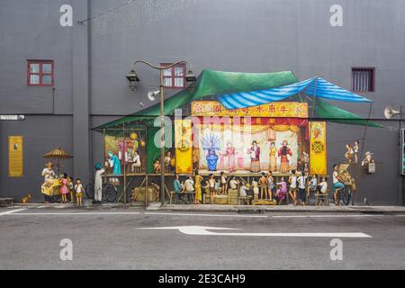 Colourful wall art murals by Singapore street artist Yip Yew Chong. Drawings are based on his childhood memories of his life and Singapore's culture. Stock Photo