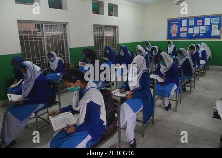 Pakistani students wearing facemasks to attend their first day of school with SOP,s, at govt kinnaird high school in Lahore Stock Photo