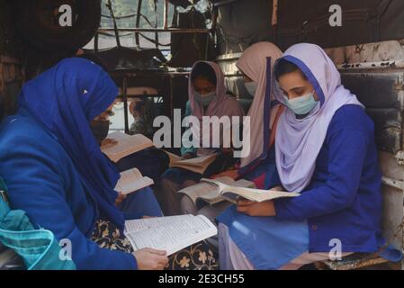 Pakistani students wearing facemasks to attend their first day of school with SOP,s, at govt kinnaird high school in Lahore Stock Photo