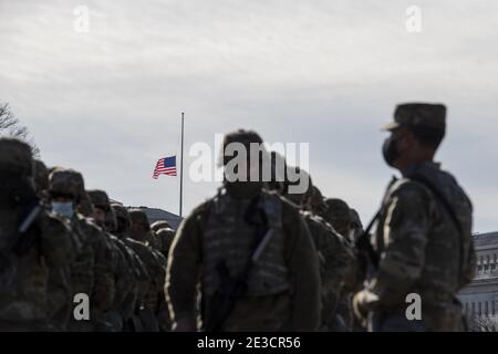 Washington, United States. 18th Jan, 2021. Members of the US National Guard arrive as the US Capitol goes into lockdown from a security breach during the dress rehearsal for the 59th inaugural ceremony for President-elect Joe Biden and Vice President-elect Kamala Harris at the U.S. Capitol on January 18, 2021 in Washington, DC. Biden will be sworn-in as the 46th president on January 20th. Pool Photo by Rod Lamkey/UPI Credit: UPI/Alamy Live News Stock Photo