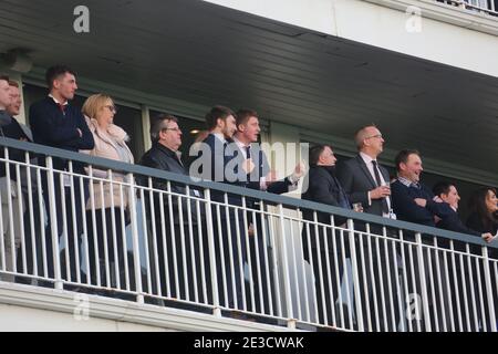 New Year race meeting at Ayr racecourse 2 Jan 2018. Crowds in the grandstand  cheer on the race Stock Photo