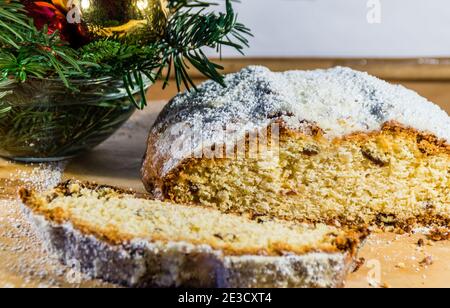 Christmas stollen on wooden background. Stock Photo