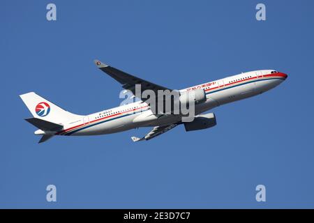 China Eastern Airlines Airbus A330-200 with registration B-6537 airborne at Frankfurt Airport. Stock Photo
