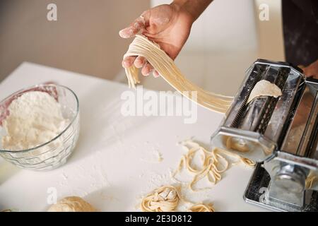 Homemade spaghetti cooking process close up photo Stock Photo