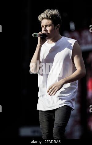Copenhagen, Denmark. 16th, June 2014. The popular boy band One Direction performs a live concert at Parken in Copenhagen. Here singer and musician Niall Horan is seen live on stage. (Photo credit: Gonzales Photo - Lasse Lagoni). Stock Photo