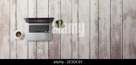 Flat lay top view office desk working space with laptop on vintage background. Copy space. Stock Photo