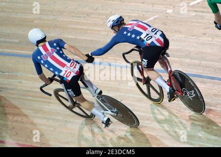 Daniel Holloway and Gavin Hoover exchange in the men’s madison, UCI Track Cycling, World Cup, Milton, Ontario, Canada Jan. 26, 2020 Stock Photo
