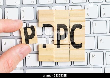 Model pay per click PPC for advertising on websites Stock Photo