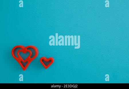 Red heart on blue background romantic colorful pattern, copy space for text. Stock Photo